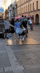 Street performers draw crowds on Saint Petersburg's Nevsky Prospekt