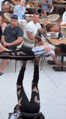 Acrobats perform dinner show at Alanya restaurant during sunset