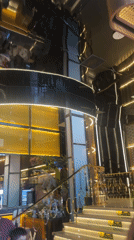 Inside a sleek, ornate Barcelona venue with dramatic gold and black interiors.