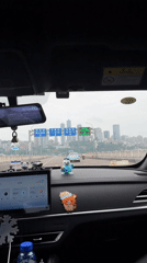 Driver crosses bridge in Nan'an District, captures cityscape view