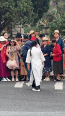 Group poses for photo at Da Lat crosswalk