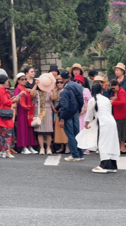 Group poses for photo at Da Lat crosswalk