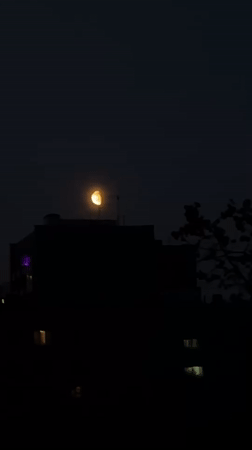 Nighttime scenes captured in Khimki suburb under crescent moon