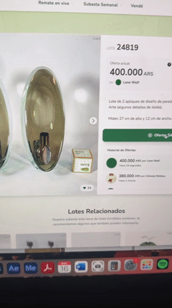 Fontana Arte wall sconces listed in Buenos Aires online auction
