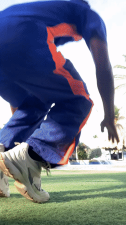 Man performs calisthenics workout on Porlamar lawn