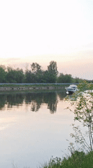 Evening river traffic observed during sunset in Dmitrov