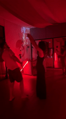 Couples dance in red-lit studio on Ko Pha-ngan