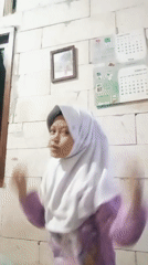 Child's playful photo session captured in Baron, Indonesia home