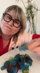 Woman shares quiet evening snacks with Pomeranian in France