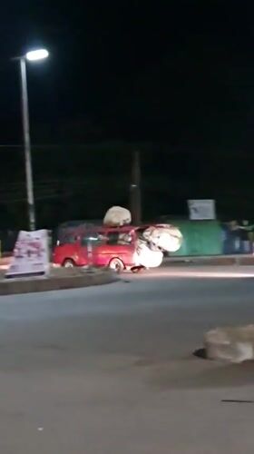Bukuru streets buzzing with nighttime foot and vehicle traffic