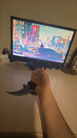 Gamer handles knife while playing Fortnite in Yerevan apartment
