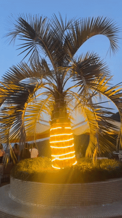 Lit-up terrace dining spot at twilight in Sarpi, Georgia