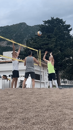 Early morning beach gathering in Boreti, Montenegro draws volleyball players