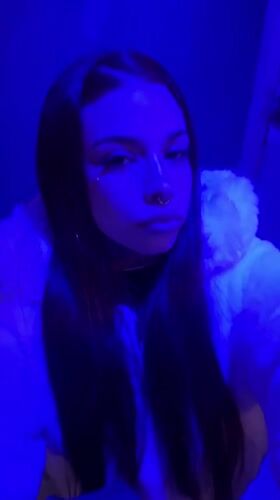 Young women take bathroom selfies during Buenos Aires night out