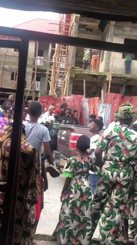 Colorful Ankara gathering in the streets of Ado, Nigeria