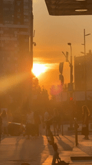 Moscow pedestrians in silhouette at golden hour