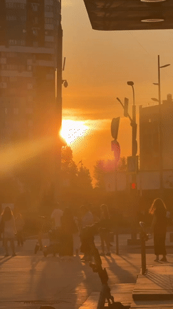 Moscow pedestrians in silhouette at golden hour
