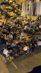 Summer evening on a busy Las Rozas plaza terrace