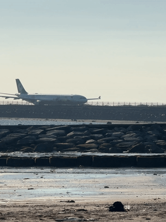Decorated Airbus A330 taxis on runway near Kuta