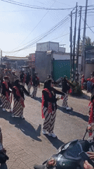 Traditional neighborhood parade with costumes and ceremony, Kepuh Kiriman