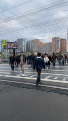 Ordinary moments captured: street crossing, artwork in progress