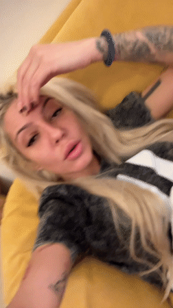 Woman photographed on yellow sofa in Sofia apartment