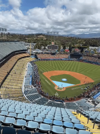 Baseball game in progress at Dodger Stadium with crowds