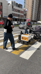 Delivery robots navigate crosswalks in Murino, Russia