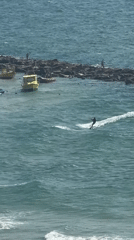 Kitesurfers ride choppy waters off Netanya coast Monday afternoon