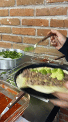 Late-night Mexican food gathering features dining, dancing, beer toasts