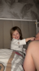 Family bedtime moments captured in Russian home