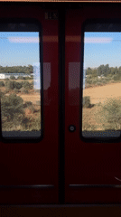 Street scenes and transit views across Jerusalem on a sunny afternoon