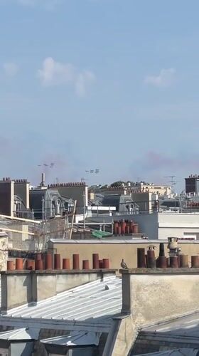 Bastille Day flyover above Paris rooftops, July 14th