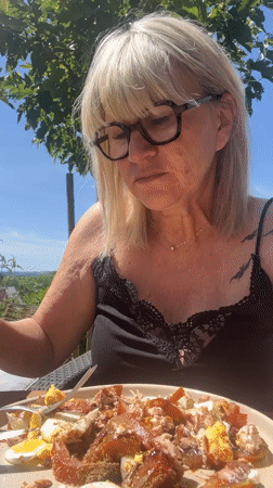 Woman's morning routine with pet dog captured in France