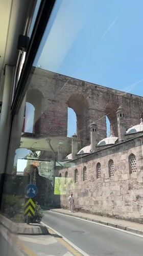 Ancient stone aqueduct filmed from vehicle in Istanbul