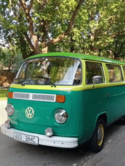Classic VW van parked under summer trees in Tallinn