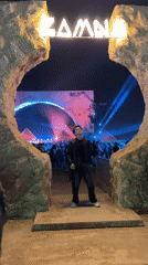 Man enters ZAMNA event through lit archway in Giza