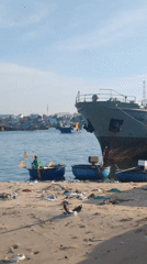 Evening harbor activity captured at Phan Thiết Vietnam port