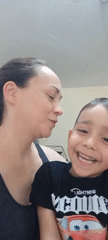 Mother and son share playful balloon moment in Krasnodar