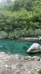 Riverside evening in Montenegro with local beer in hand
