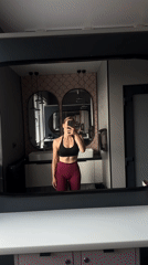 Gym mirror selfies in Ternopil, athletic wear, early morning