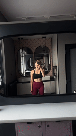 Gym mirror selfies in Ternopil, athletic wear, early morning