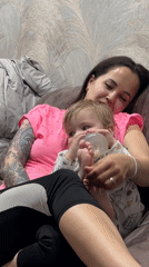 Mother and child share intimate moments at home