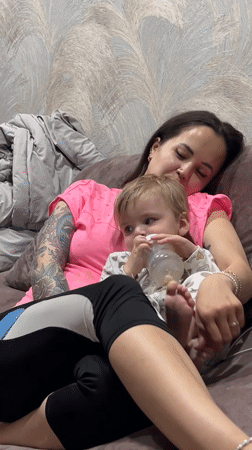 Mother and child share intimate moments at home