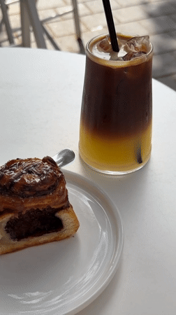 Chocolate pastry and iced drink at a Bat Yam café