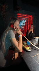 St. Petersburg bar patrons dine, game, chat vintage phones