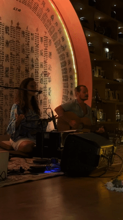Intimate acoustic music performance in decorated Ubud venue
