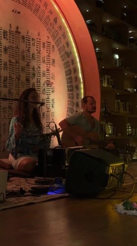 Intimate acoustic music performance in decorated Ubud venue