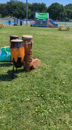 Montreal park festival setup underway on a sunny afternoon
