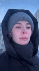 Winter morning scenes documented in snowy Kyiv residential area
